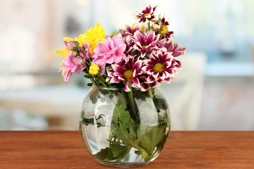 Elegant arrangement of roses and lilies